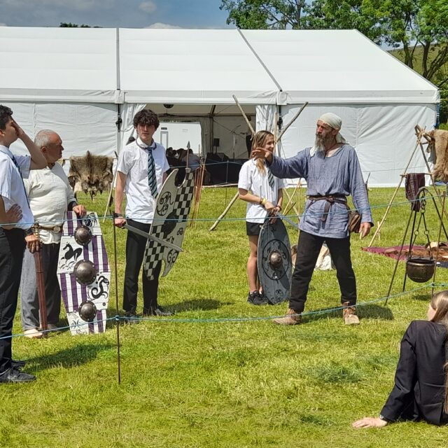School children learning about Iron Age life at Chalke Valley History Festival 2022